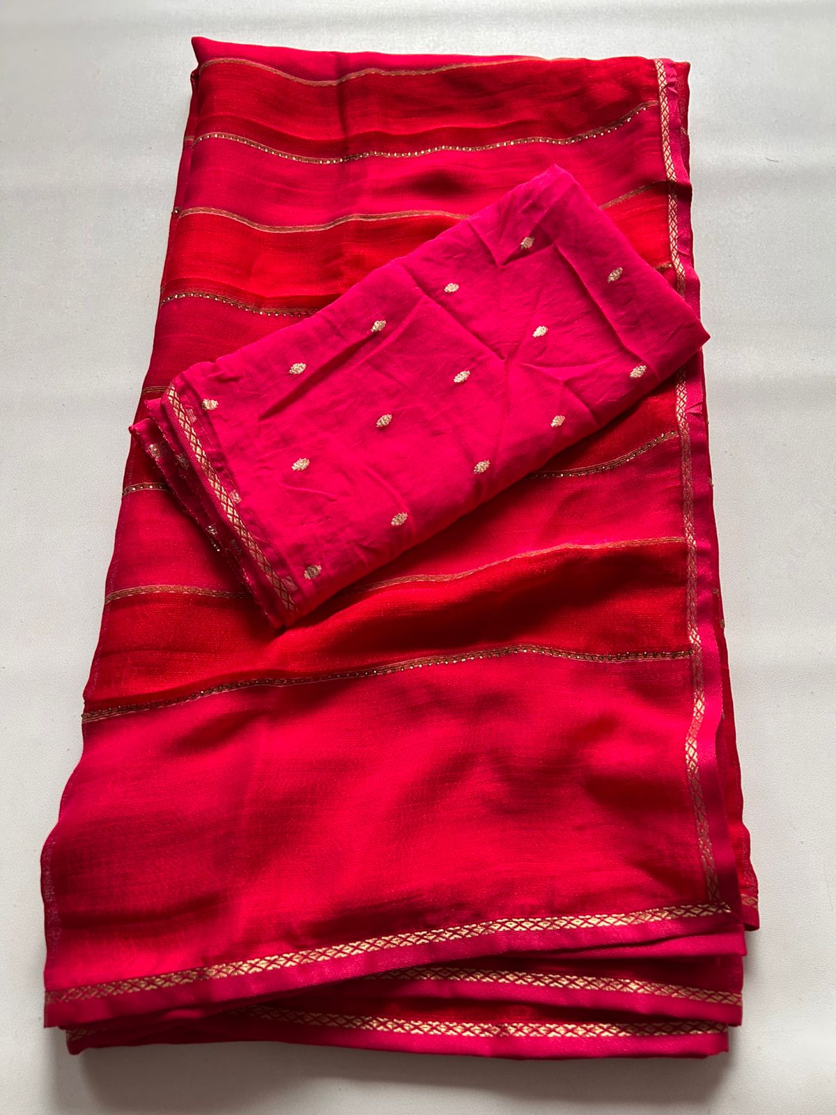 New Partywear Red Fancy Chiffon Georgette Saree with multi tone stipes allover stone drop work lines Blouse as shown